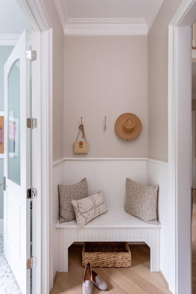 Styled hallway with storage.