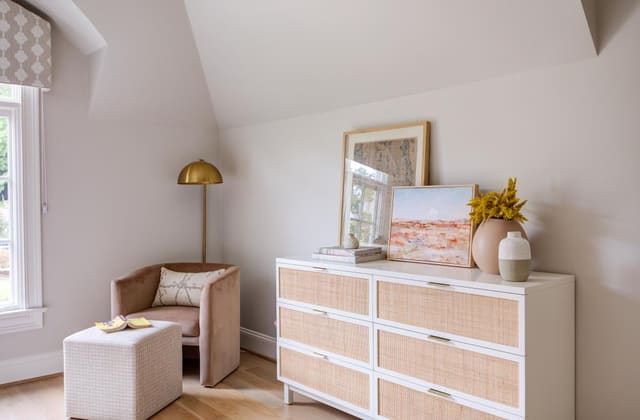 Dresser with an occasional chair.