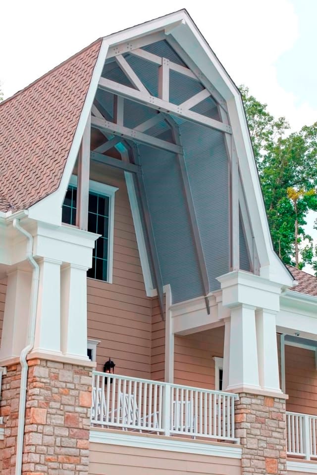 Exterior of Hamptons style Clubhouse in Raleigh showing gable roof with transoms