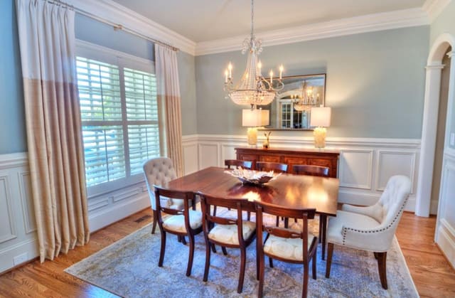 Raleigh (ITB) Dining Room with custom silk drapery on lucite rod, tiered calcite lamps, and decorative bowl accessory