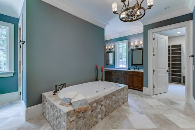 Master Bathroom in Raleigh home with unique tile tub surround