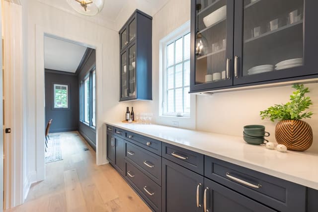 Kitchen extended with navy cabinetry