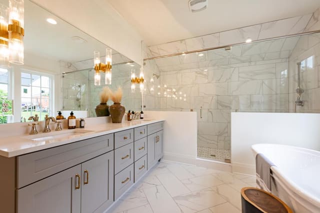 Bathroom with marble floors and shower
