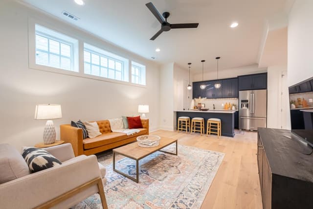 Rec room living area open concept into kitchen