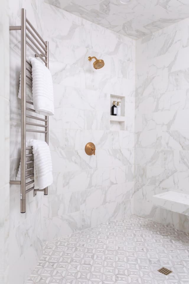 Master bathroom shower, mixed hardware.