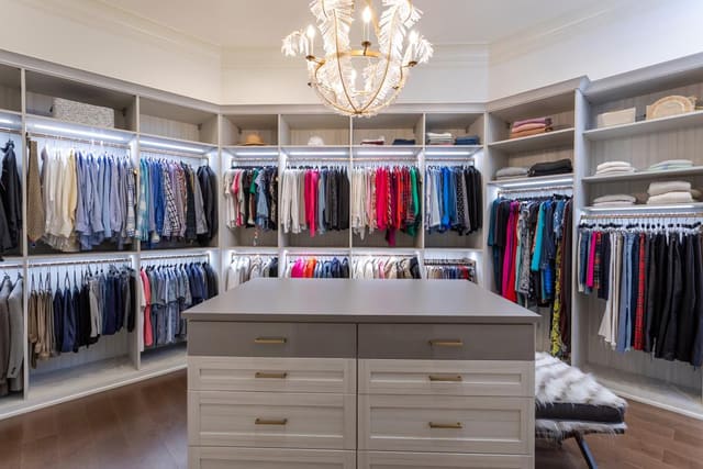 Master bedroom closet, Visual Comfort chandelier.