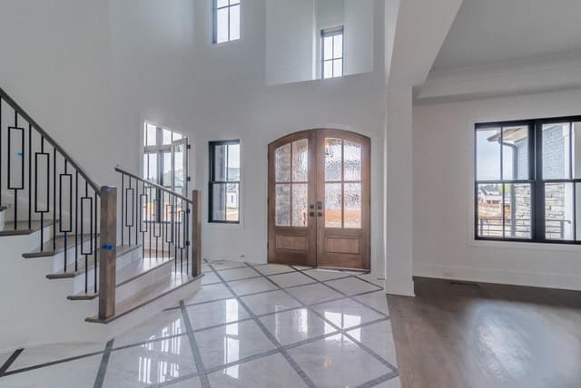 Foyer with Arch-Top Double Entry Doors