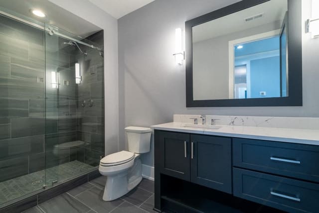 2nd Guest Bath with Black Cabinets and Silver Accents