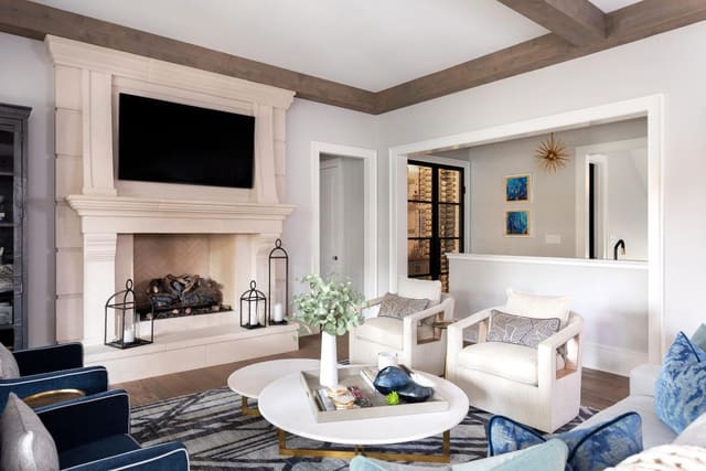 Family Room with Modern Pillows and Blue and Gold Accents
