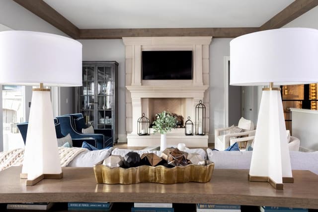 Family Room with John-Richard's accents framed by Chelsea House White and Gold Lamps