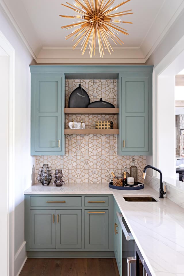 Small Bar/Study with Blue cabinetry and Gold Accents