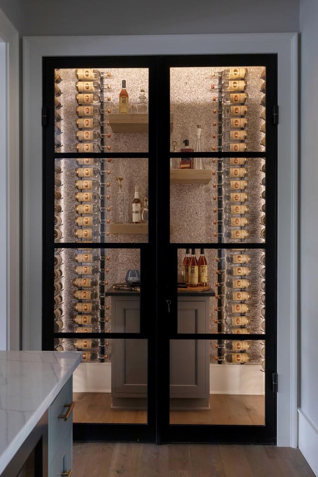 Warm-lit bar Area with Phillip Jeffries Granite Stone Wallpaper