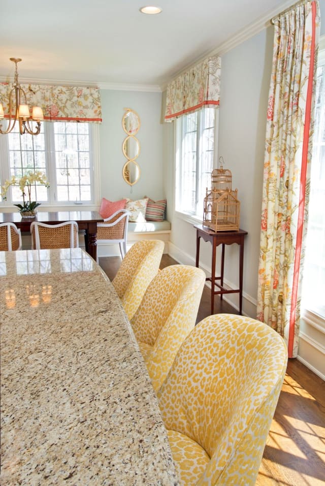 West Raleigh Kitchen with custom window treatments, upholstered barstools, twin mirrors, and custom bench cushion with pillows