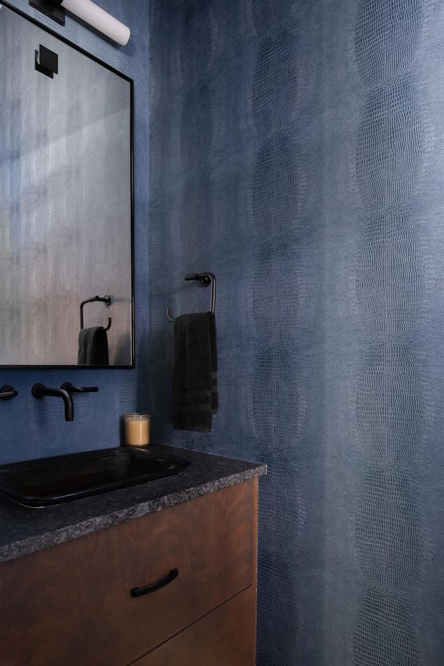 Guest Bath with Deep Blue Textured Wallpaper