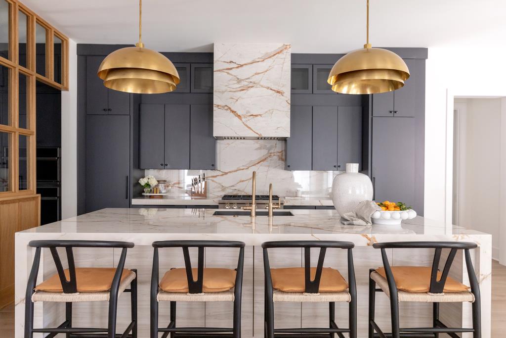 Custom kitchen island in a Raleigh modern new construction by Design Works Studio